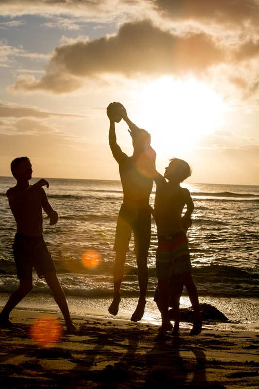 boys play beach